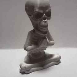 Halloween meditating skeleton