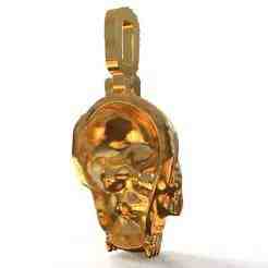 Pendant skull decorated with inlays