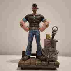 Statue or figurine of Popeye the sailor in full muscular posture with anchor and spinach