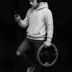 street racer holding steering wheel in 1/64 scale