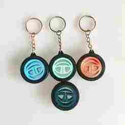 Tata Gyroscope Tire Keychain – Rotating Logo