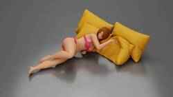 Woman in pink lingerie lying sideways resting arm with soft gaze