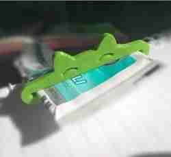 Toothpaste squeezer