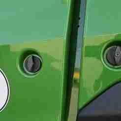 John Deere S combine sidewall opener.