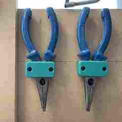 Plier tool hook for cupboard or wall