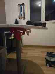 Gravity locked, print in place, vertical hinge