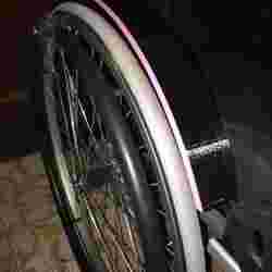 Custom mudguard for the Invacare Action 4 wheelchair.