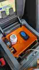 Ineos Grenadier mobile phone  and cupholder