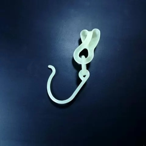 Cross-Sectioned Klein Bottle Earring by Bertan Atamer