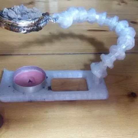Adjustable incense burner