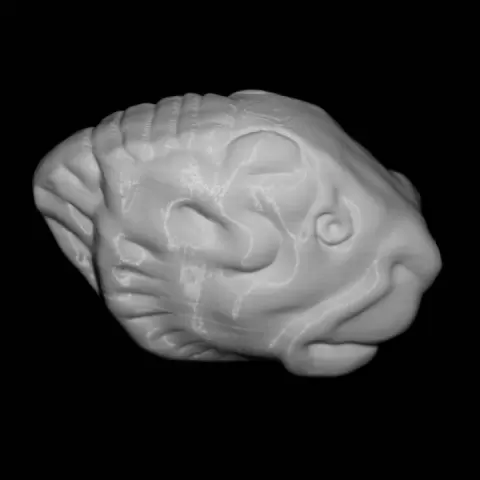Plaque in the shape of a tiger's head at The British Museum, London by Scan The World