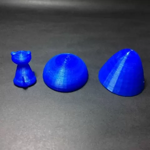 cat inside egg toy by Matthew Helphenstine