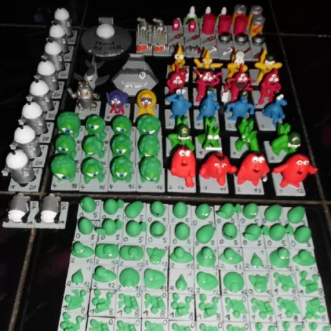 All cardboard counters of the boardgame "The awful green things from outerspace" as 3D figures by Frank Strauss
