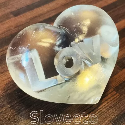 Transparent Heart Figurine with Inner 'Love' Inscription - Ideal for Valentine's Day and Everyday Expressions of Love by Yaroslav Litovchenko