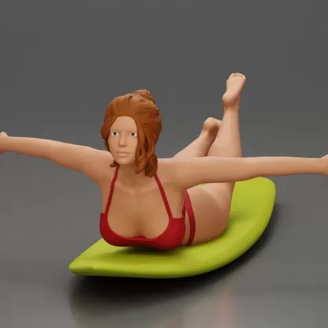 surfer girl with effortless grace, lying on her surfboard as she rides the wave by 3DGeschaft Miniatures Figures
