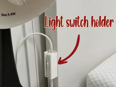 Light switch holder