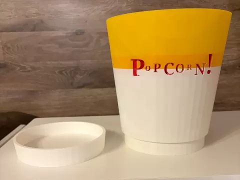 Popcorn Bucket with A Unpoped Kernal Sifter.