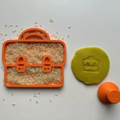 School bag stamp and tray
