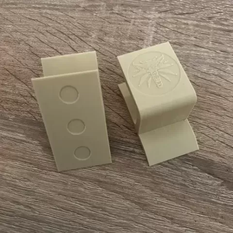 Wall-mounted cap holder