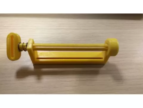 Toothpaste squeezer