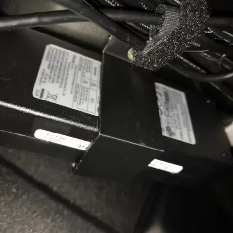 Laptop power supply holder