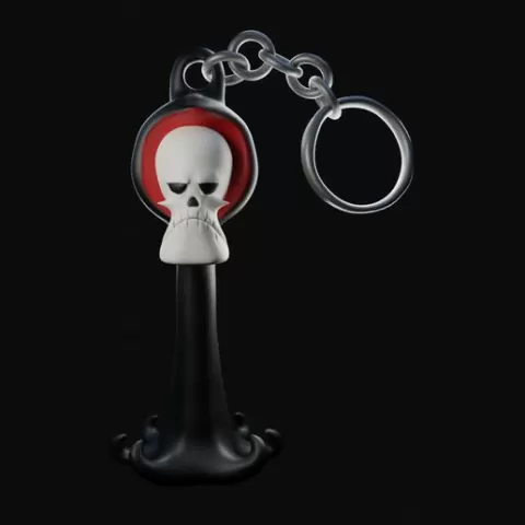 Billy and Mandy's Pure Bone keychain with two different faces.