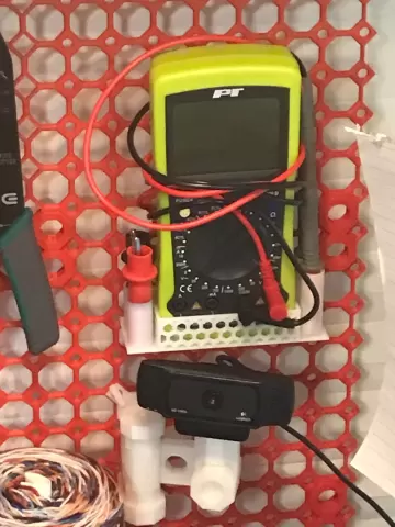 Multimeter holder for multiboard
