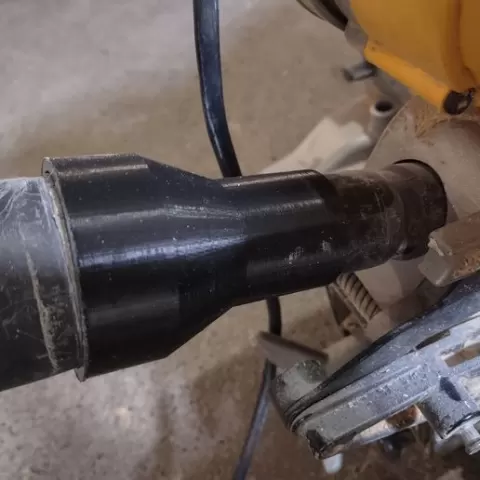 Shopvac (2-1/4") to Dewalt saw (1-1/2") adaptor, for dust collection. No Supports.