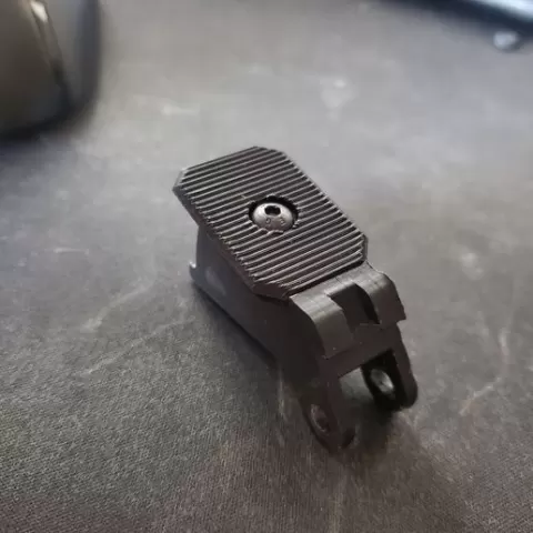 Steyr AUG extended magazine release