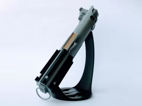 Tilted display stand for lightsaber hilt