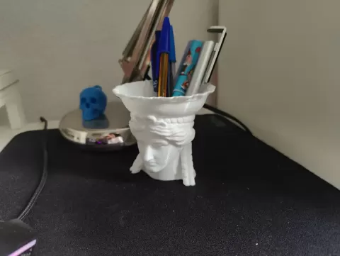 Caryatid pencil holder