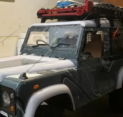 Limb risers hood mount