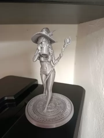 Beautiful witch drinking beer - Wexik