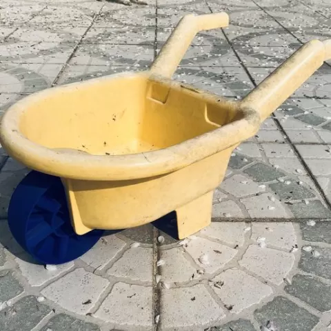 Wheelbarrow child (toy)