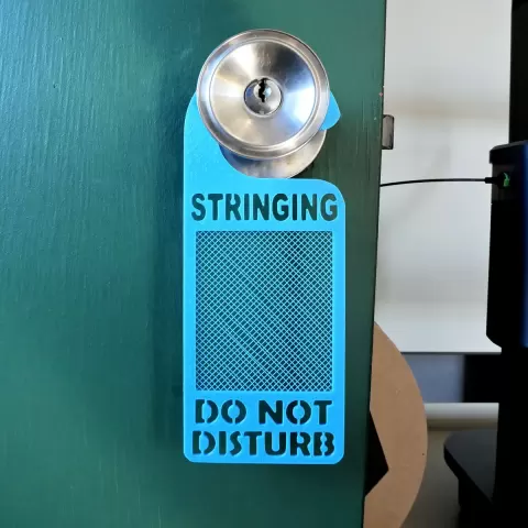 Stringing Do Not Disturb Sign