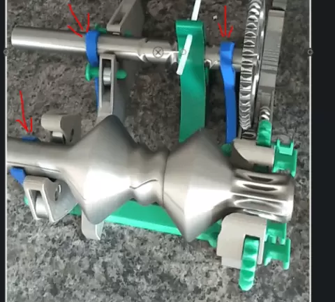 Mechanical transfer device for respooling filament.
