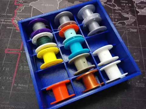 Sewing spool for bernina sewing machine and storage bin