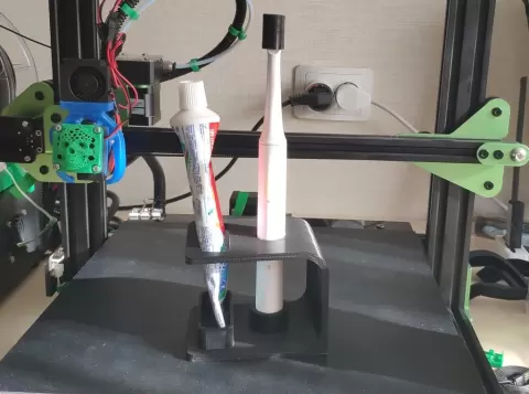 Toothpaste and brush holder