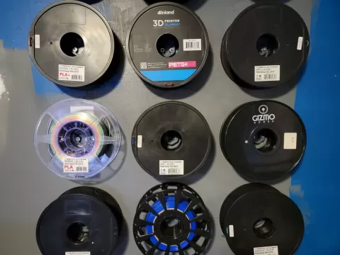 Wall mount filament spool