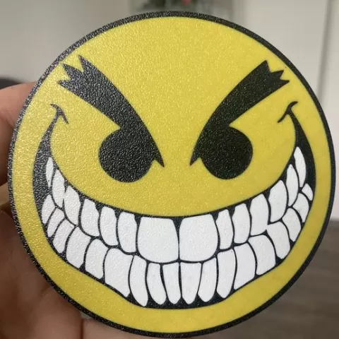 Angry smiling emoji coaster