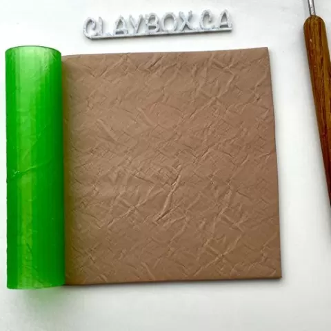 Crumpled paper texture roller