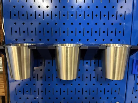 A cup holder to keep your tools organized for the DDD Printable Wall Control system