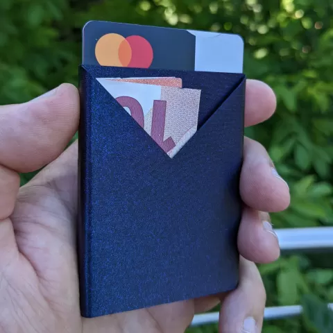 Single piece slim wallet for cards, bills and coins