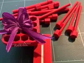Add on bow maker for fabric tube turner