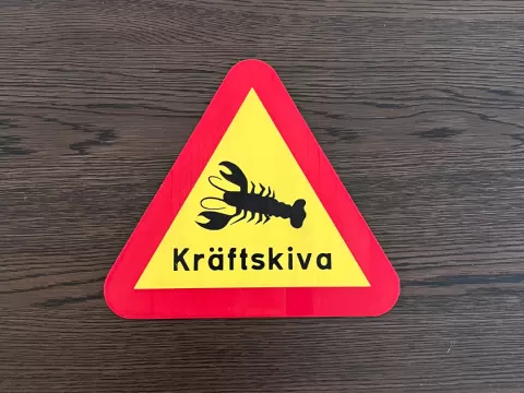 Varningsskylt Kräftskiva