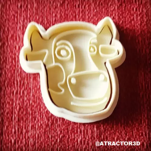 CUTTING COOKIE AND SEAL COW AND DETAIL CUTTING COOKIE AND SEAL COW