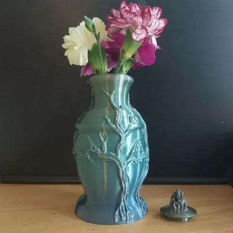 Vase with tree design and lid