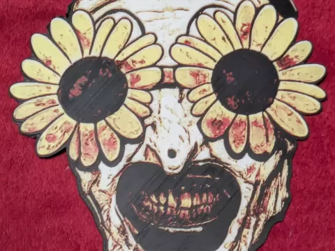 Art the Clown with sunflowers hueforge wall art