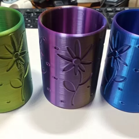 Organizer or cup or cylindrical vase with a pattern
