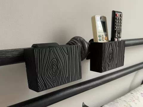 Remote control holder for tube bed headboard